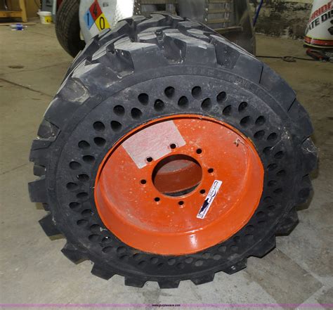 used skid steer tires near|solid bobcat tires and rims.